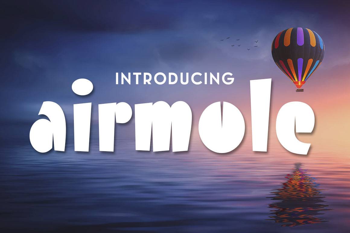 Airmole Font displayed in bold, theatrical sans serif style with a hot air balloon and serene sunset background.