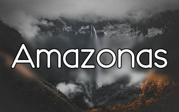 Amazonas Font displayed over a misty forest and waterfall background.