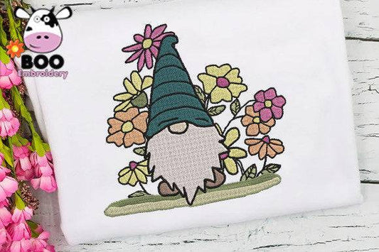 Gnome embroidery design surrounded by colorful spring flowers.