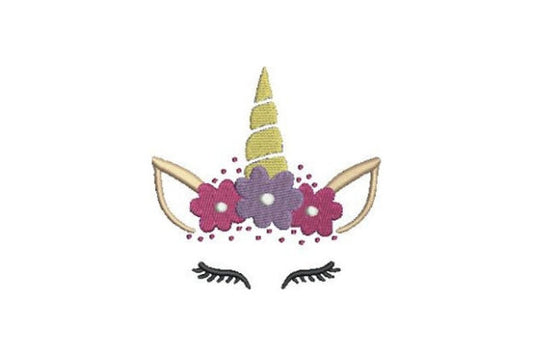 Diseño de bordado de cara de unicornio con flores